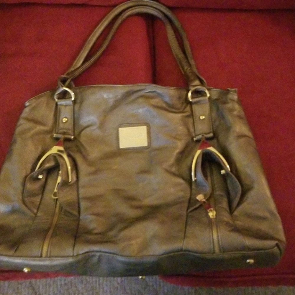 Women's gray purse with gold accents